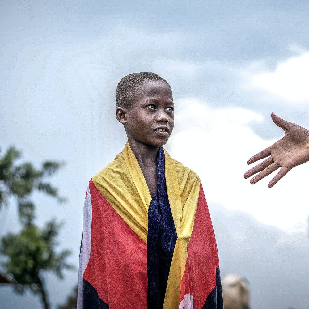 african-boy-looking-at-a-raised-hand.jpg african-boy-looking-at-a-raised-hand.jpg